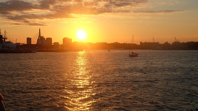 Sunset over the Boston skyline and harbor with Zakim Bridge