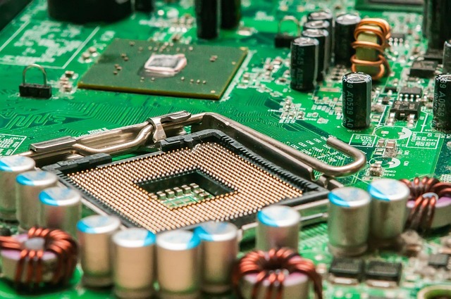 Close-up photo of a computer motherboard showing the location of a TPM chip