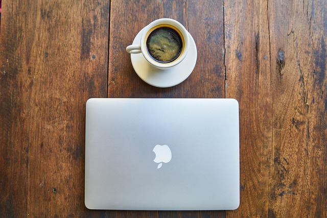 Close-up of a modern Apple MacBook Pro with its screen displaying creative software. (macbook vs pixelbook)