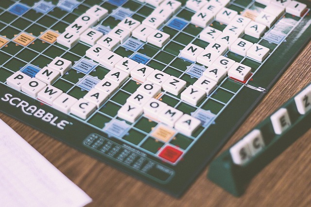A collage of Scrabble words containing X and E, illustrating strategic combinations