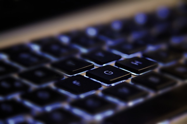 A close-up view of a backlit computer keyboard