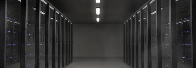 A dark server room with rows of server racks