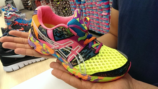 Cutaway view of Asics Exeo wrestling shoe showing breathable mesh upper and padded collar