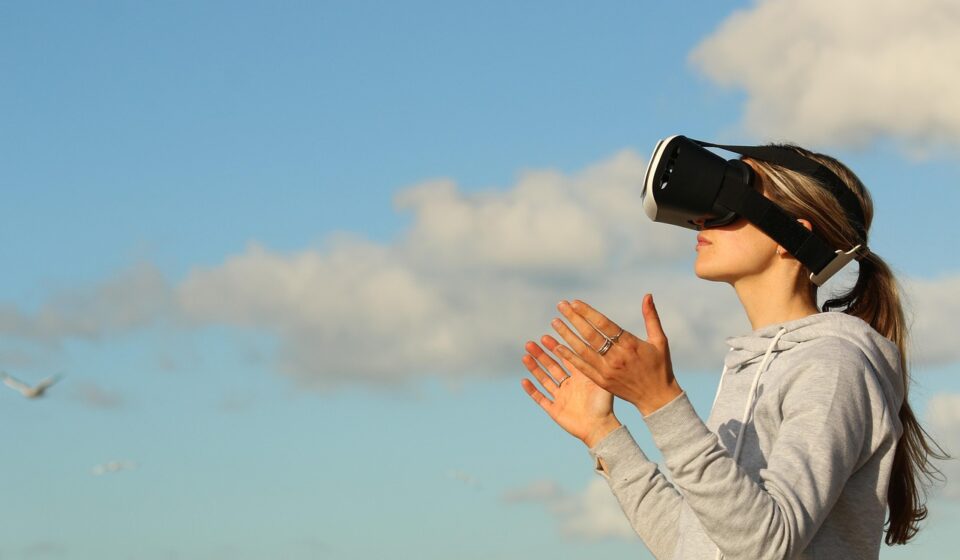 gamer in immersive virtual reality headset