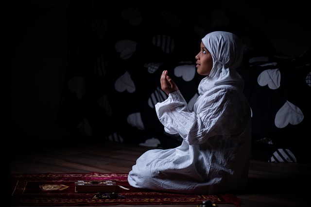 Group of Muslims praying Maghrib prayer together in a mosque