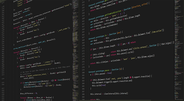 Computer programming source code on a dark screen