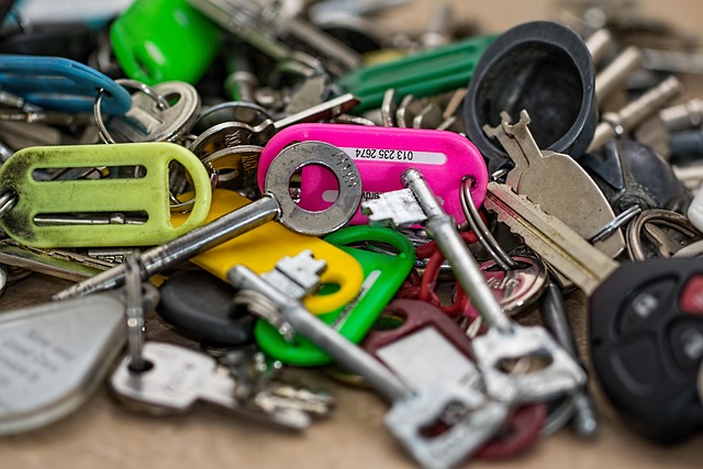 A large pile of various keys and colorful key fobs
