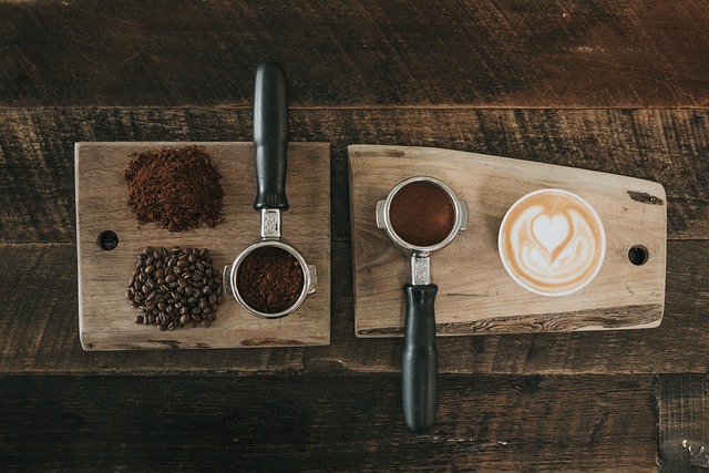 Breville Barista Express Impress machine with a portafilter filled with coffee grounds.