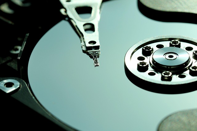 Close up of the platter and head inside a mechanical hard drive