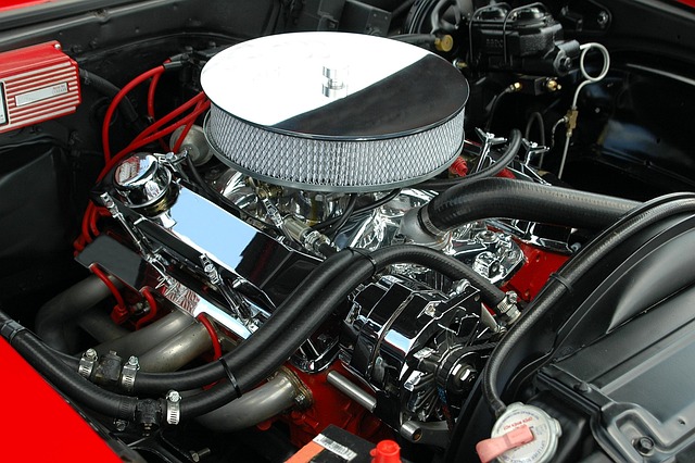 A high performance car engine with chrome components in an engine bay