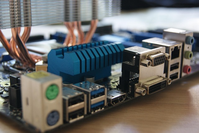 Screenshot of a PC motherboard with AIO pump and fan cables being connected.