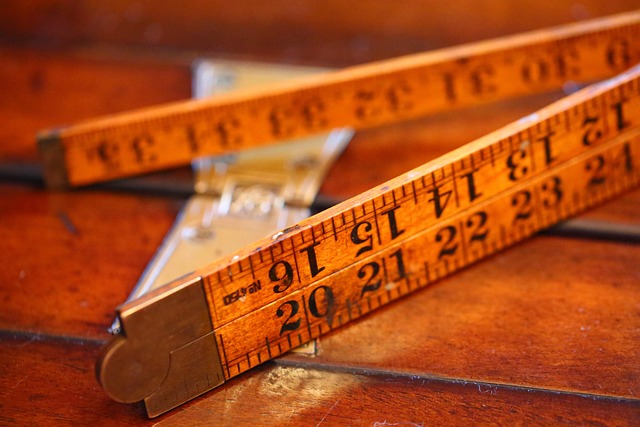 A wooden folding ruler with measurement markings